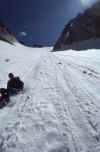 1988-038 Colchuck Pk N Buttress Jul 1988 014 Glissading to Colchuck Lake.jpg (154646 bytes)