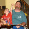 knocking off Dads hat.jpg (96765 bytes)