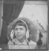 Phyllis Kuester as a Young Girl 3 with War Bonnet.jpg (100519 bytes)